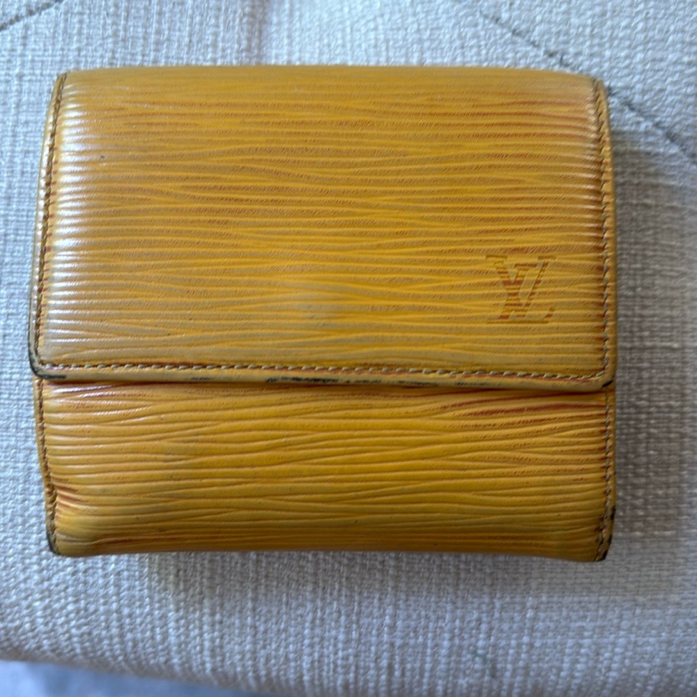 Louis Vuitton wallet well loved but has lots of life left